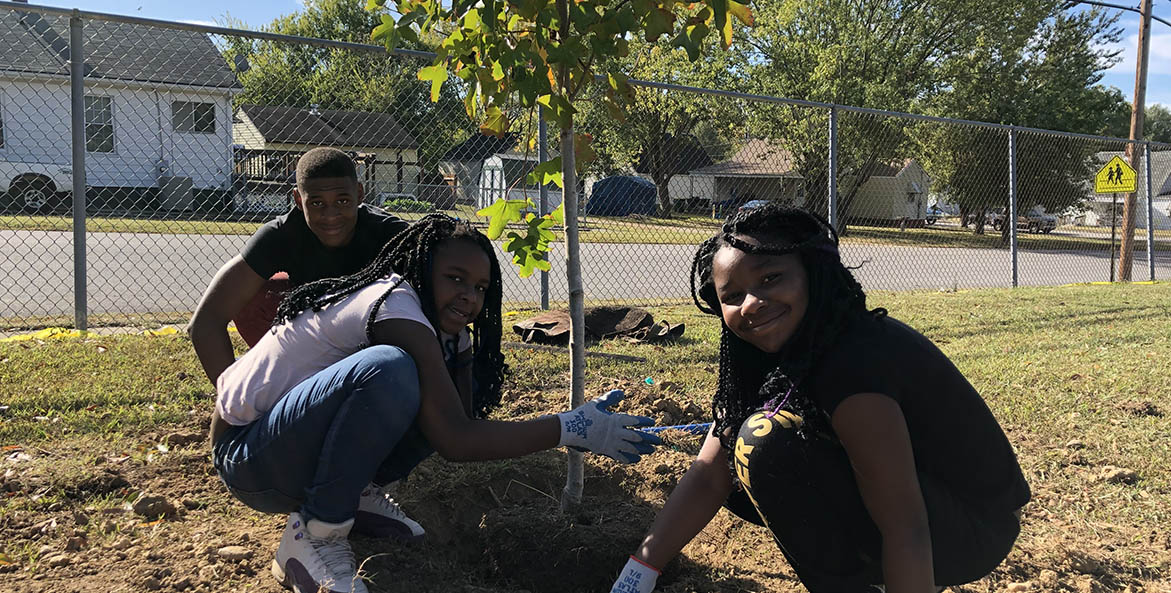 Planting trees at Hopewell’s DuPont Elementary School