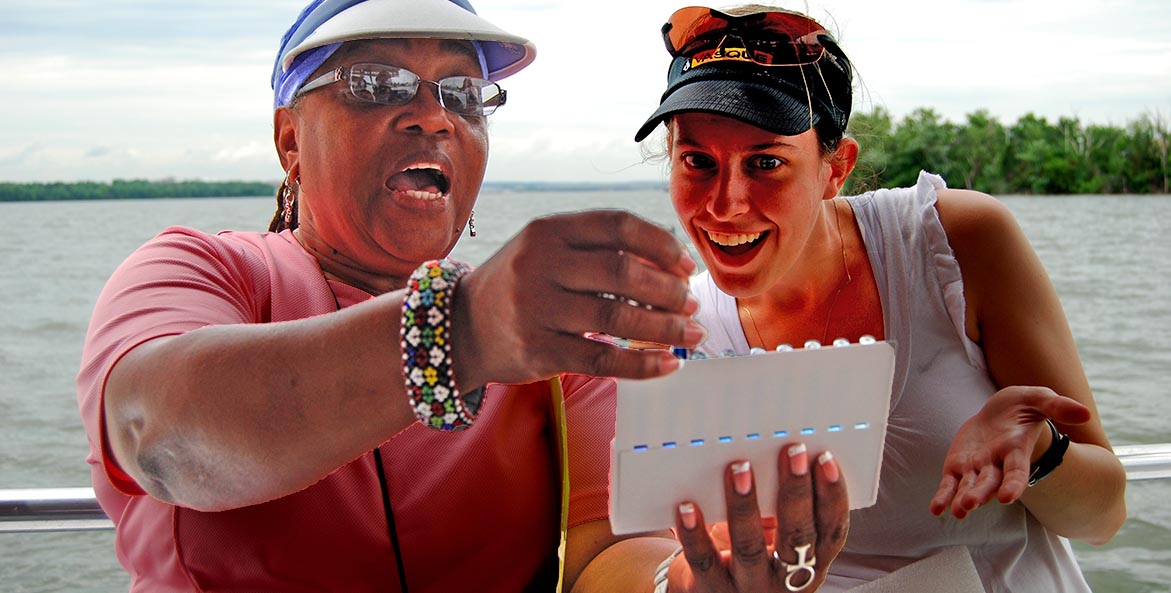 Teachers collect water samples CBFStaff 1171x593