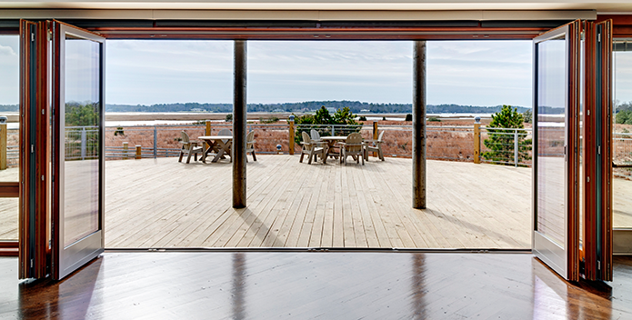 Brock-Environmental-Center_back-deck_DaveChancePhotographyHouriganConstruction_695x352