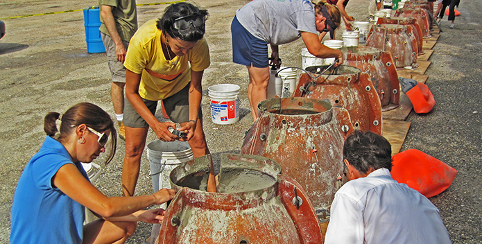 Oyster-Restoration-Reef-Ball-building-MD-ORC-July-2010_695x352.png