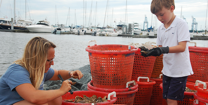 Heather North and Graham Mitchell with oysters 695x352