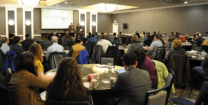 MD Shellfish Aquaculture Conference Alison Colden and Don Webser speaking-AJ Metcalf-695x352