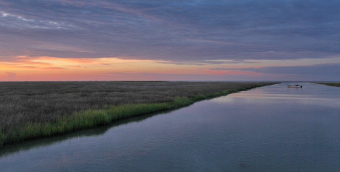 Image of a lone waterman at sunset.
