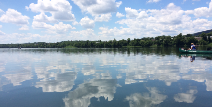 Image of clouds reflecting on the Susquehanna River.