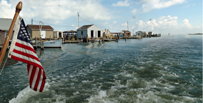 Image of crab shacks lining Tangier Island.