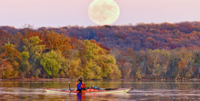 Image of the supermoon over the Potomac River.