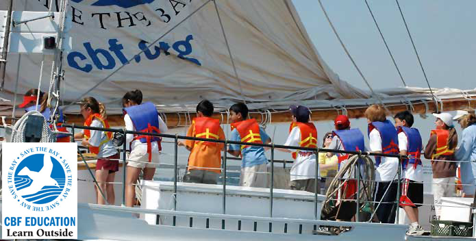 Students on Skipjack - with Learn Outside logo 695x352