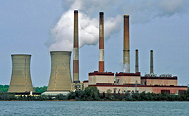 View of the Chalk Point Generating Station from the Patuxent River, showing the plant's two cooling towers and three smokestacks.