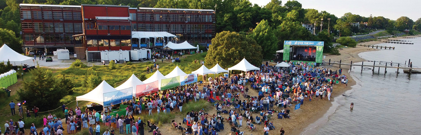 Aerial photograph of people on the beach during Bands in the Sand.