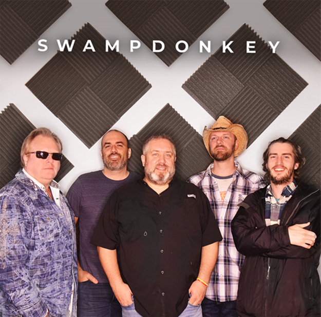 Band shot of five male band members with headline Swamp Donkey.