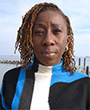 Headshot of Tola Sanni.