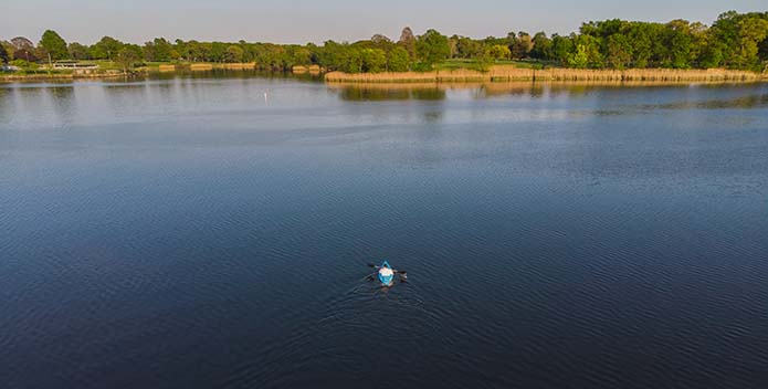 A photo of a lone kayaker on Bear Creek.