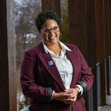 Photo of Carmera Thomas-Wilhite smiling at camera