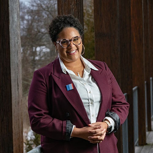 Photo of Carmera Thomas-Wilhite smiling at camera