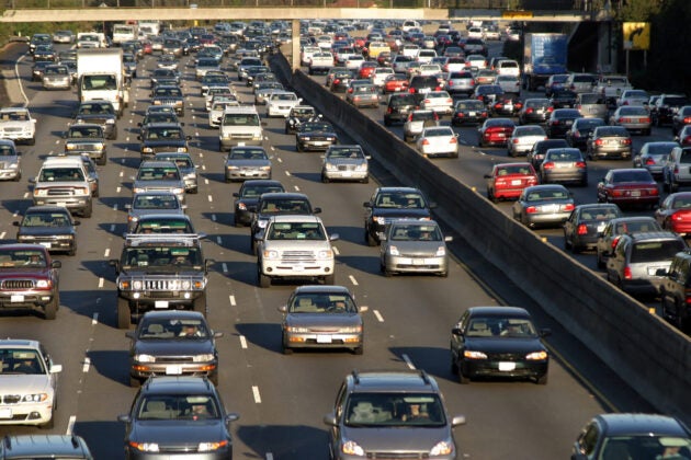 Cars jam 10 lanes on an expressway.