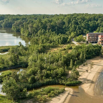 This aerial view of the Philip Merrill Center includes the full landscape, including Black Walnut Creek.