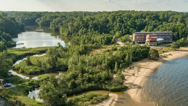 This aerial view of the Philip Merrill Center includes the full landscape, including Black Walnut Creek.
