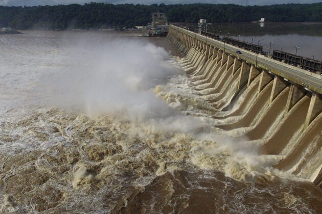 The Conowingo Dam with flood gates open and water rushing through
